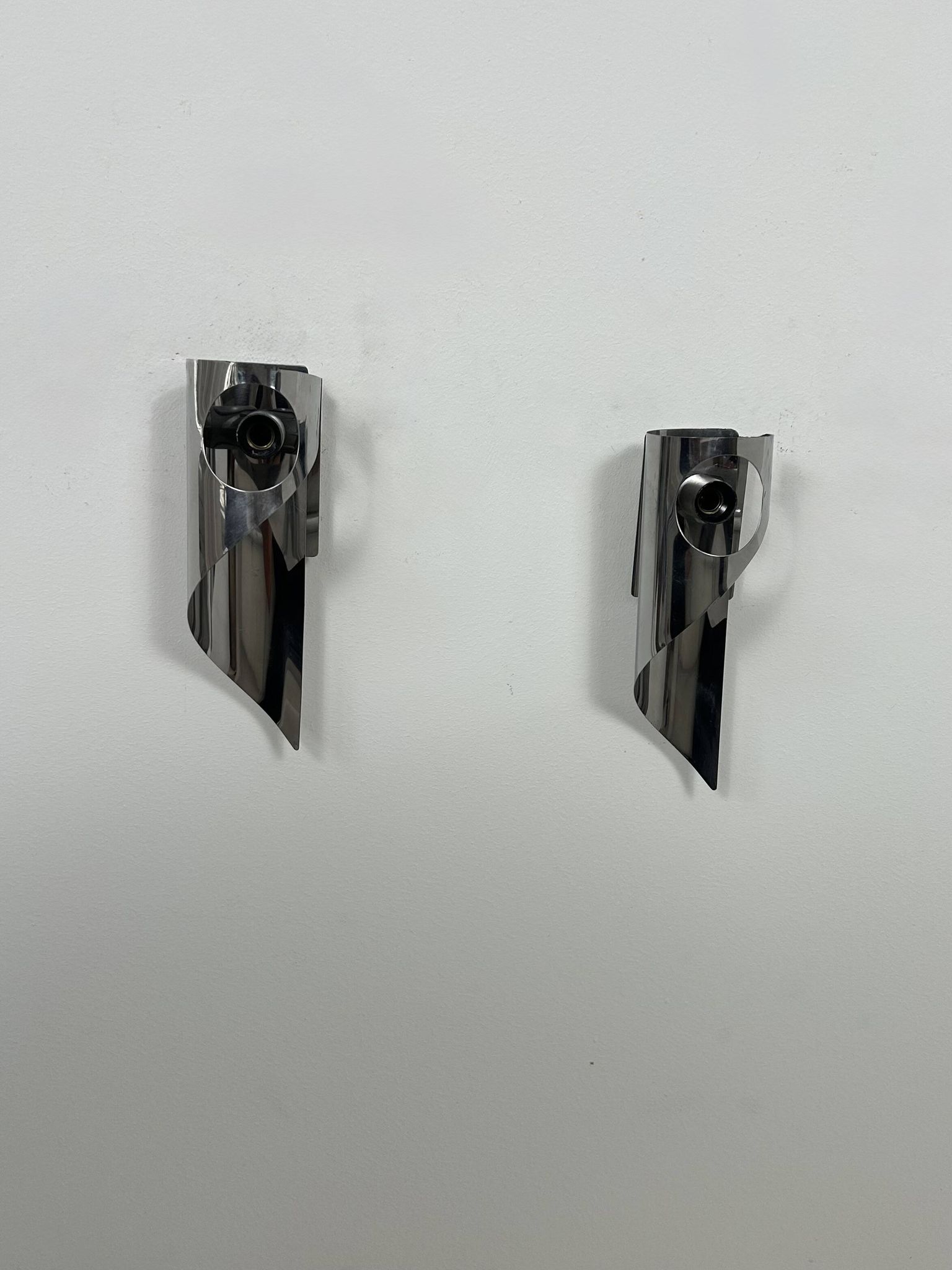 Pair of vintage wall lights, chrome metal, France, 1970.
