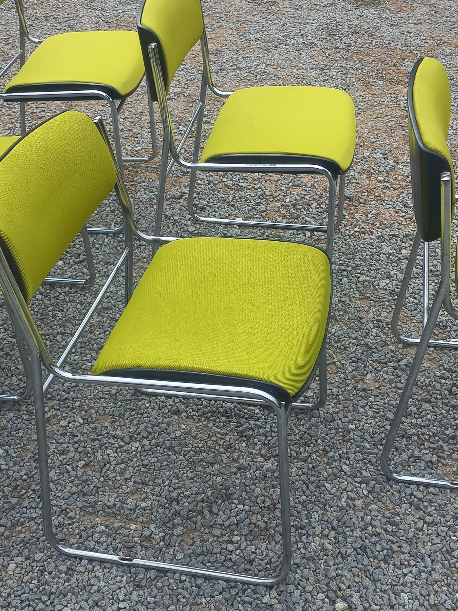 Set of 6 designer chairs with wooden seats and backs, chrome legs.