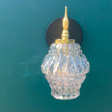 Gilded brass wall lamp and its colorful thick glass tulip