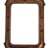 Italian sculpted mirror, patinated brown and gold wood, architectural frame from the 1960s.