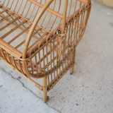 Vintage rattan crib, casters and matte for bed sky