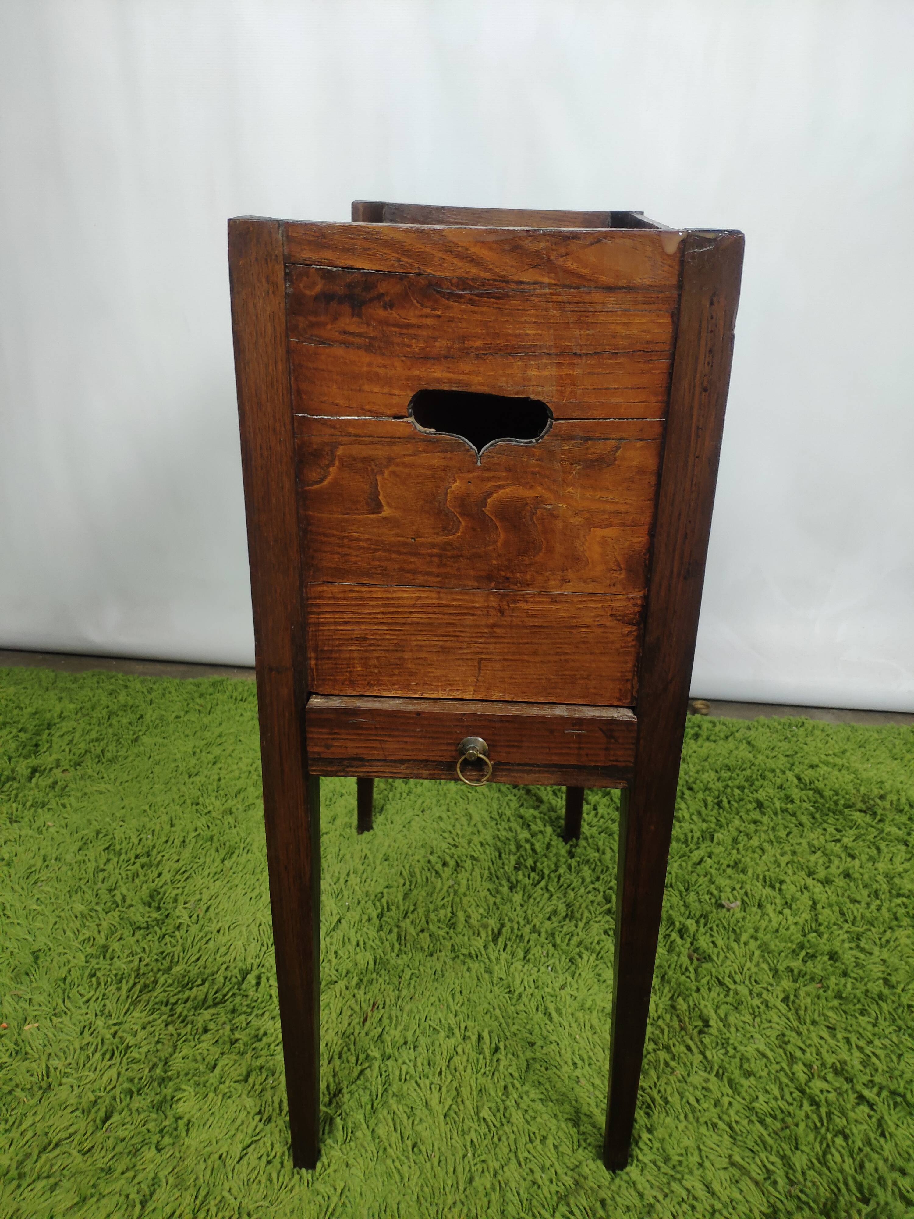 Old wooden bedside table