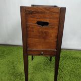 Old wooden bedside table