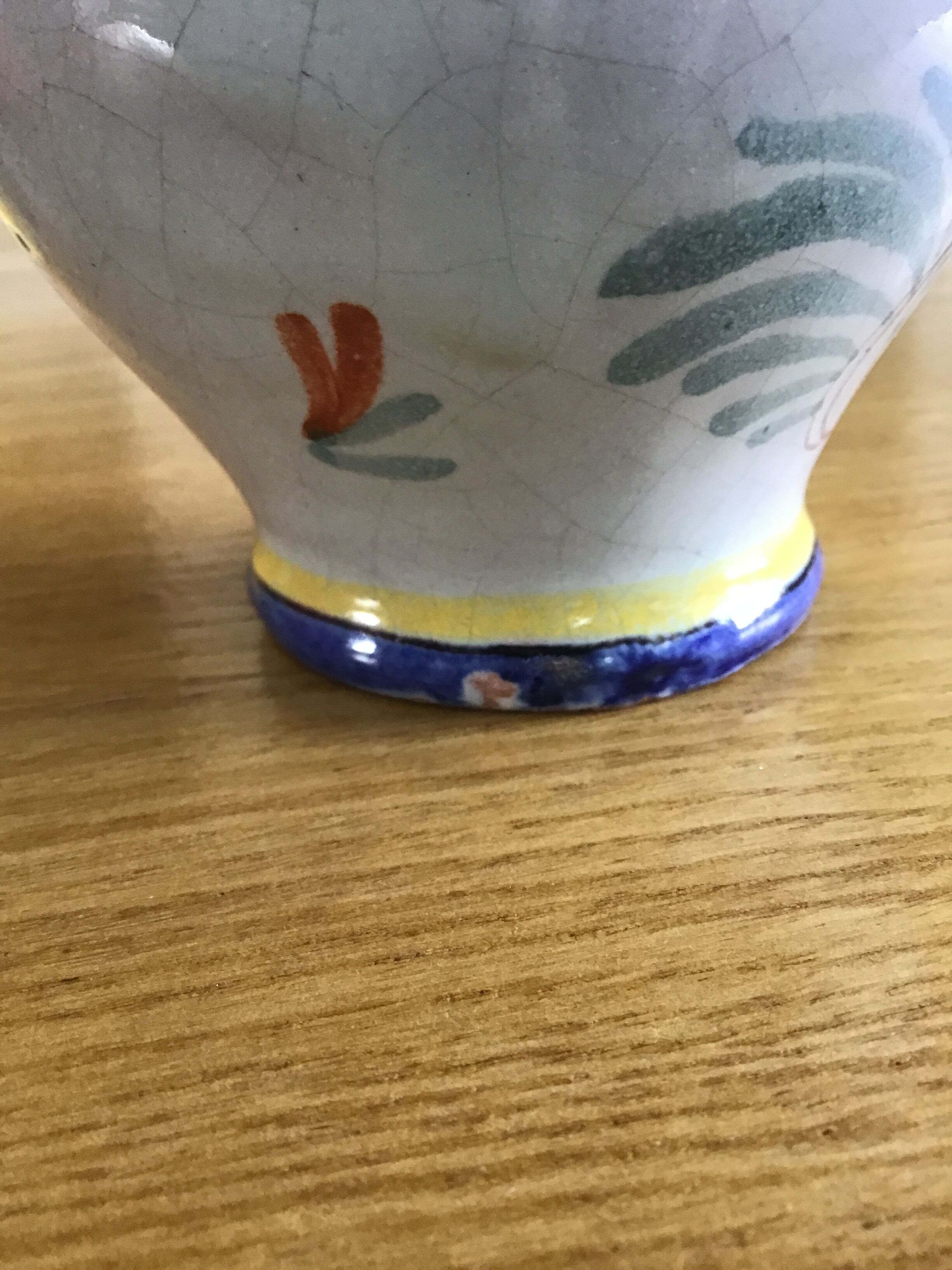 Earthenware pitcher with blue decor