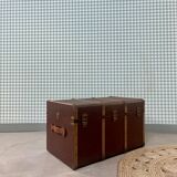 Circled travel trunk