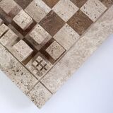 Modernist two-tone travertine chess set, Italy, 1970s