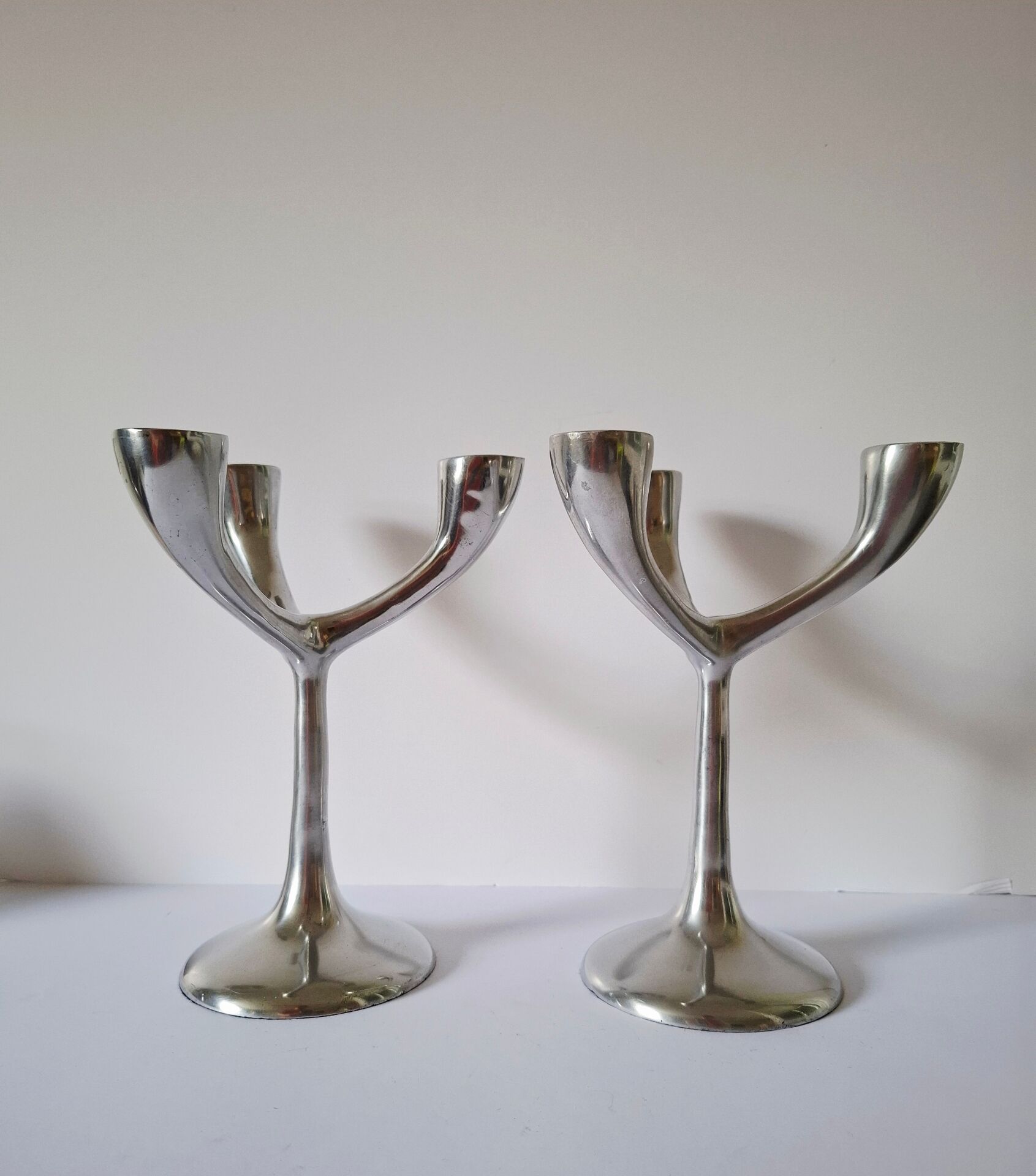 Vintage aluminium candlestick duo