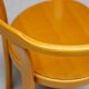 Stackable chairs in curved beech.