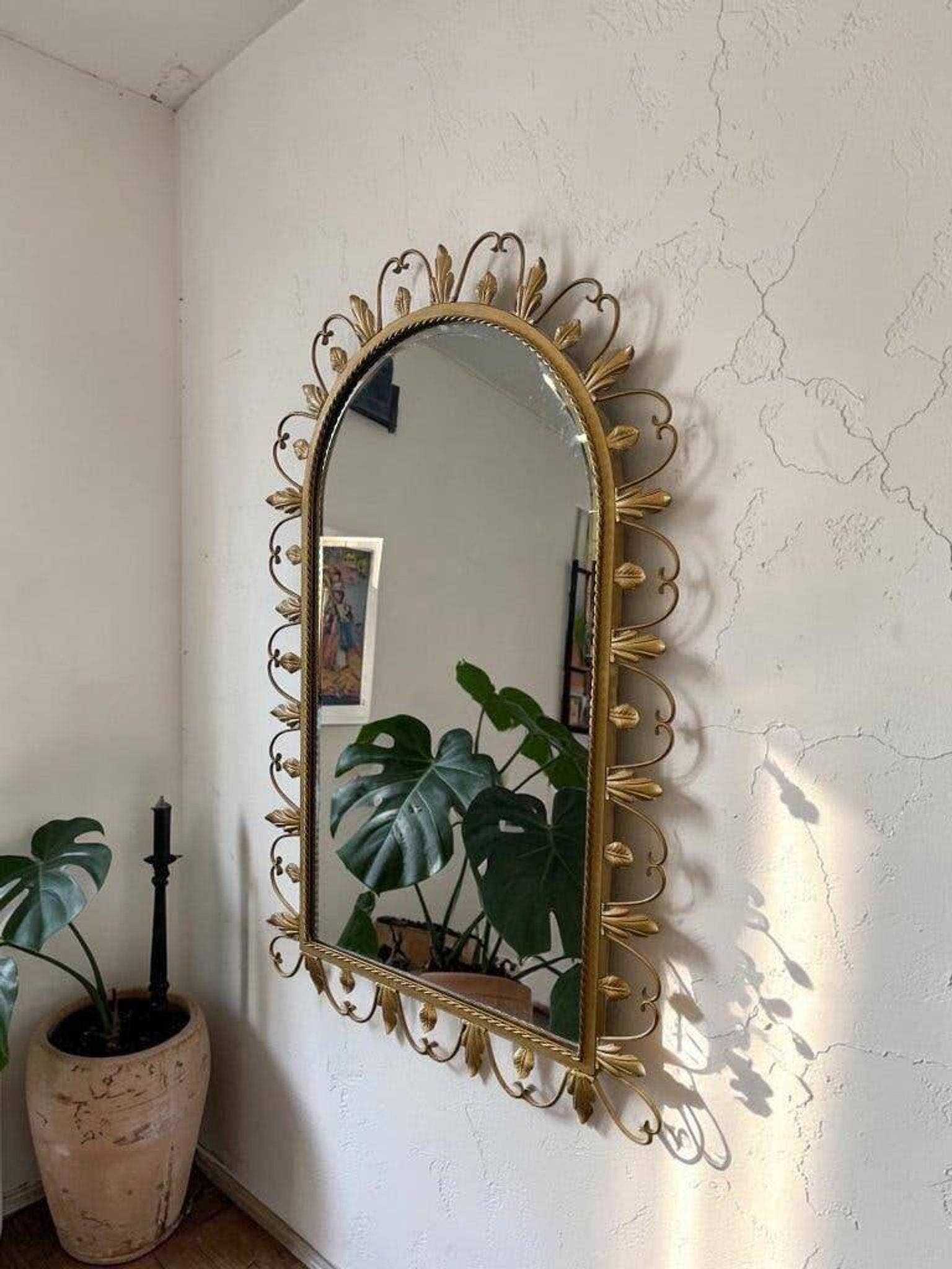 Vintage gold wall mirror with leaves