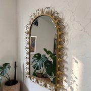 Vintage gold wall mirror with leaves