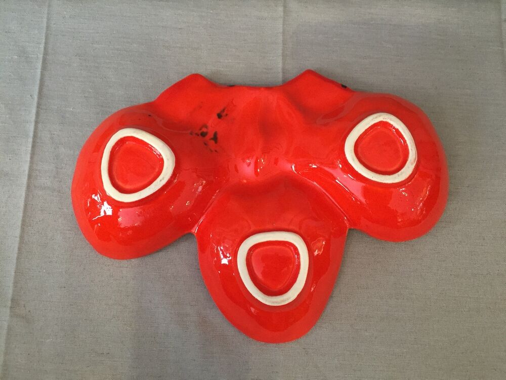 Vintage strawberry-shaped beggar or servant