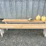 Farmhouse table with its two benches