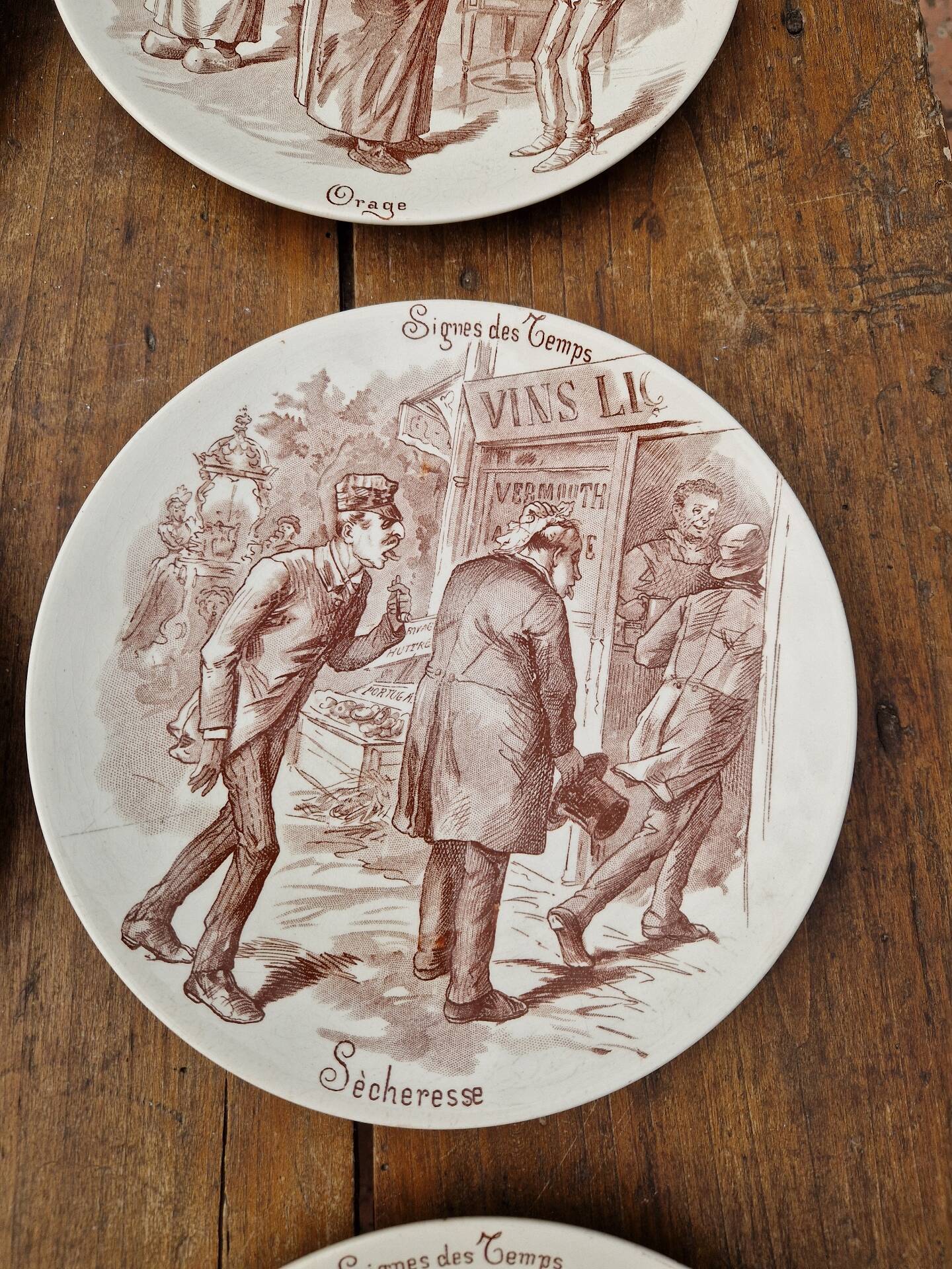 Set of 6 earthenware plates from Sarreguemines U&C Signs of the Times.