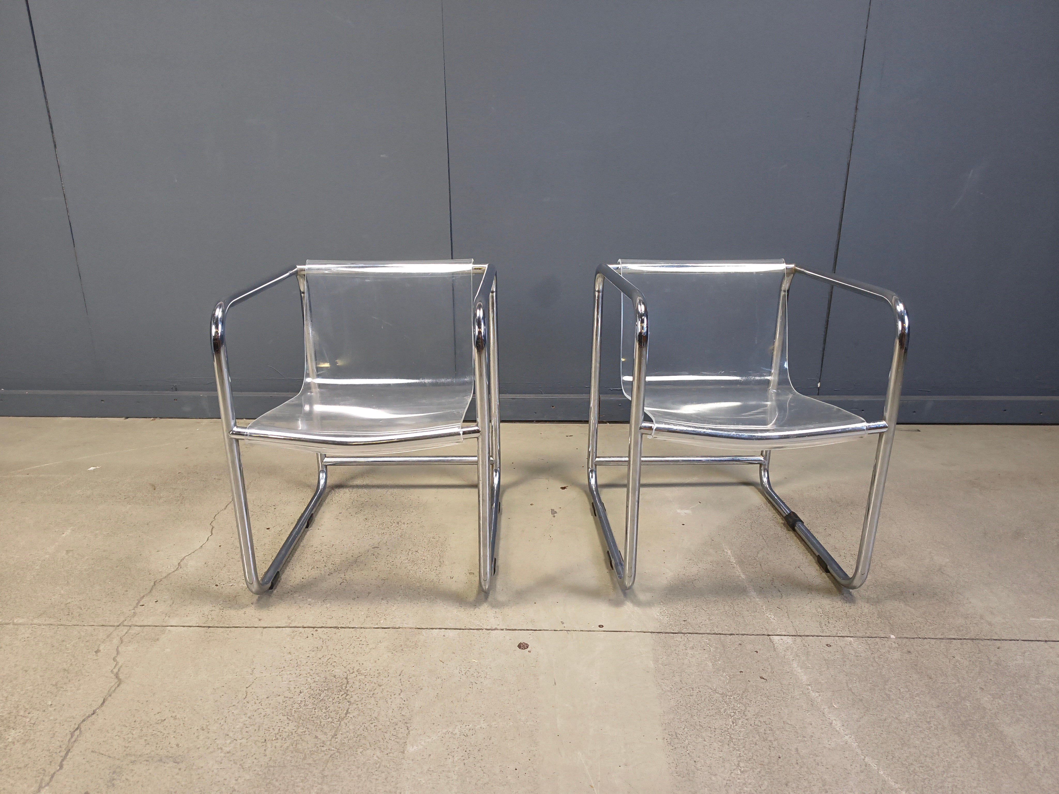 Pair of plexiglass and tubular chrome armchairs, 1970s