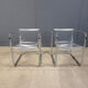 Pair of plexiglass and tubular chrome armchairs, 1970s
