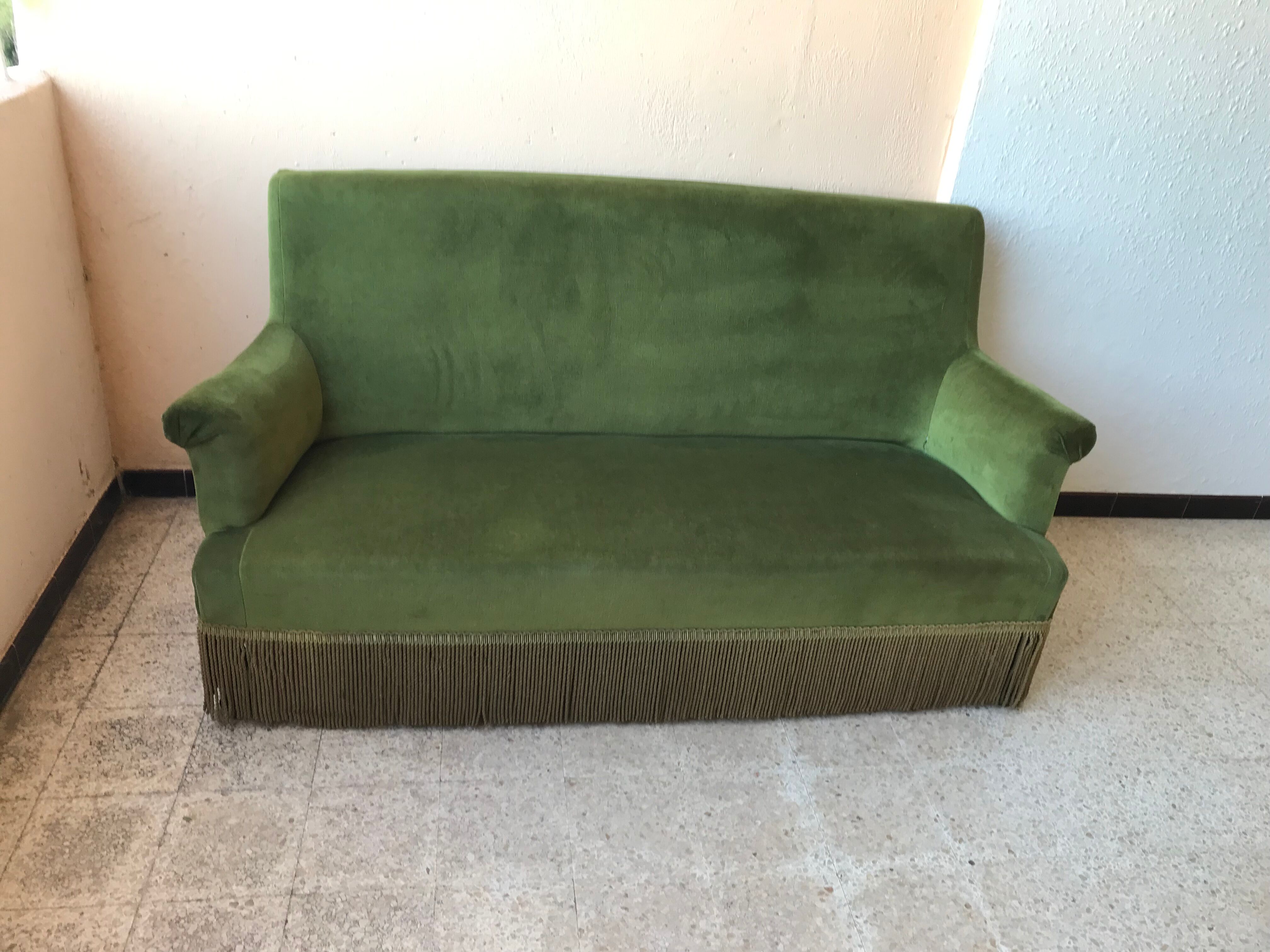 Vintage sofa in green velvet