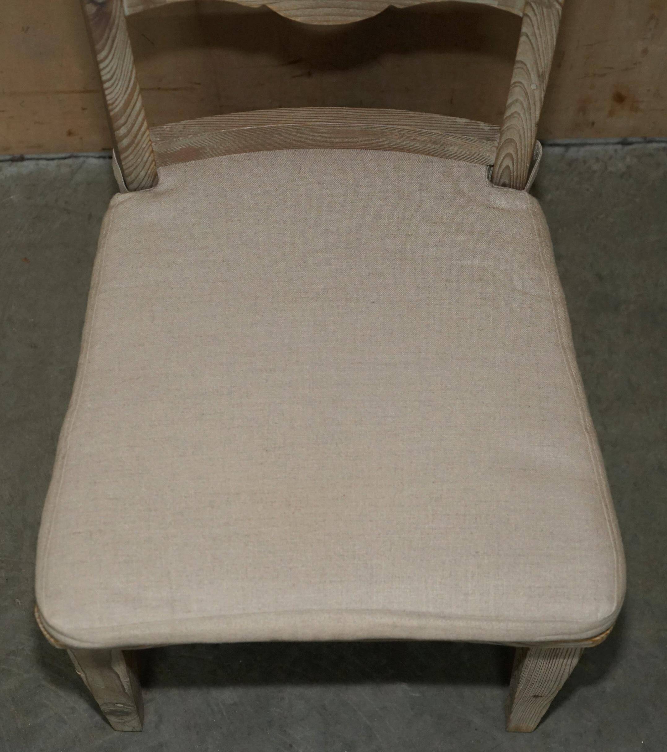 Pair of Swedish-style accent chairs in recycled pine with upholstered seats.