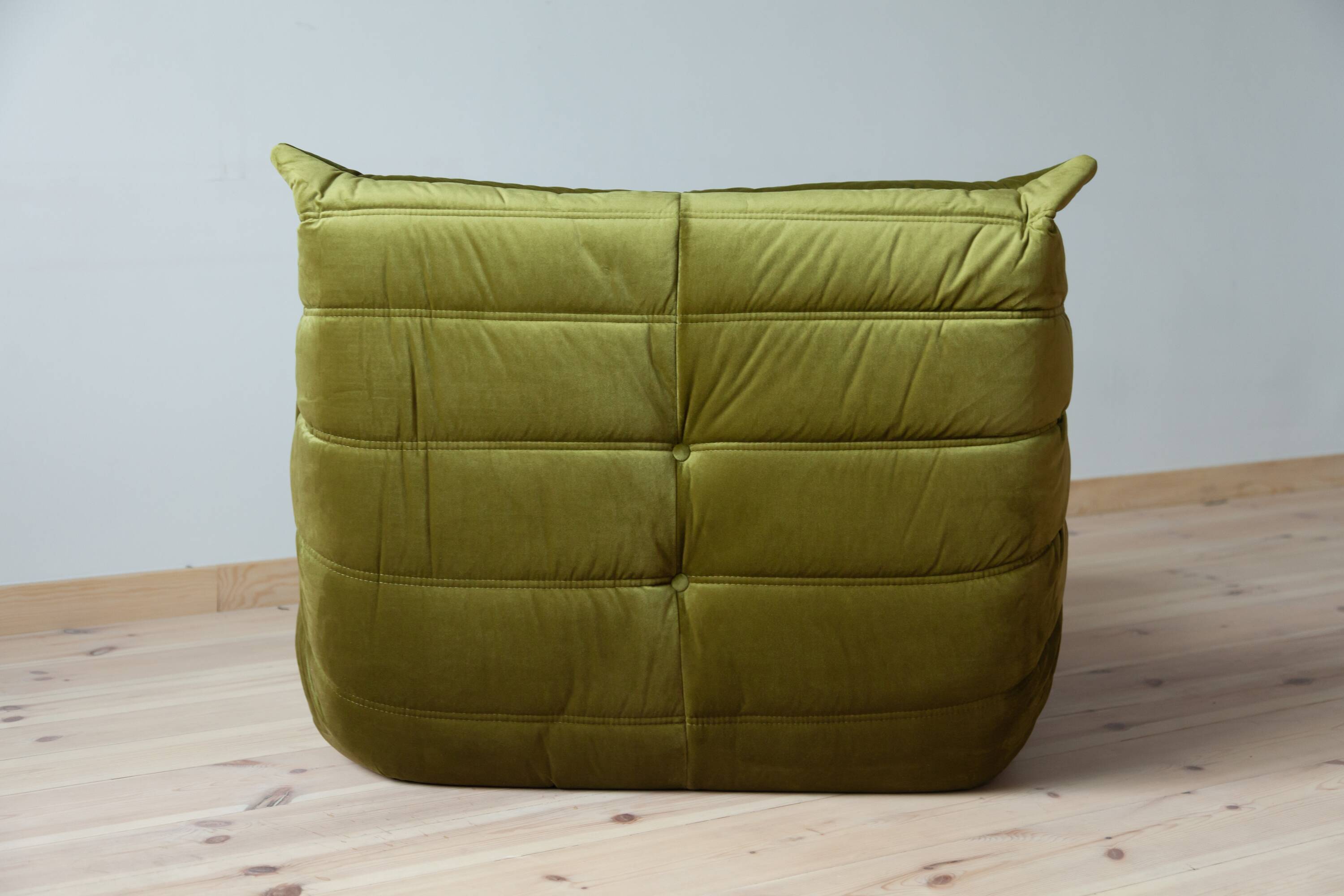 Togo armchair in olive green velvet