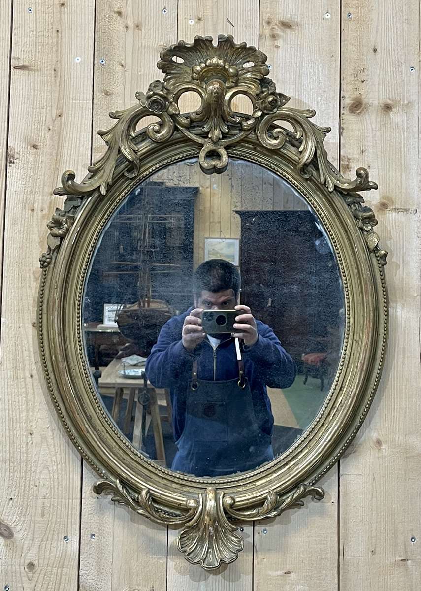 Oval mirror of the nineteenth in the Louis XV style