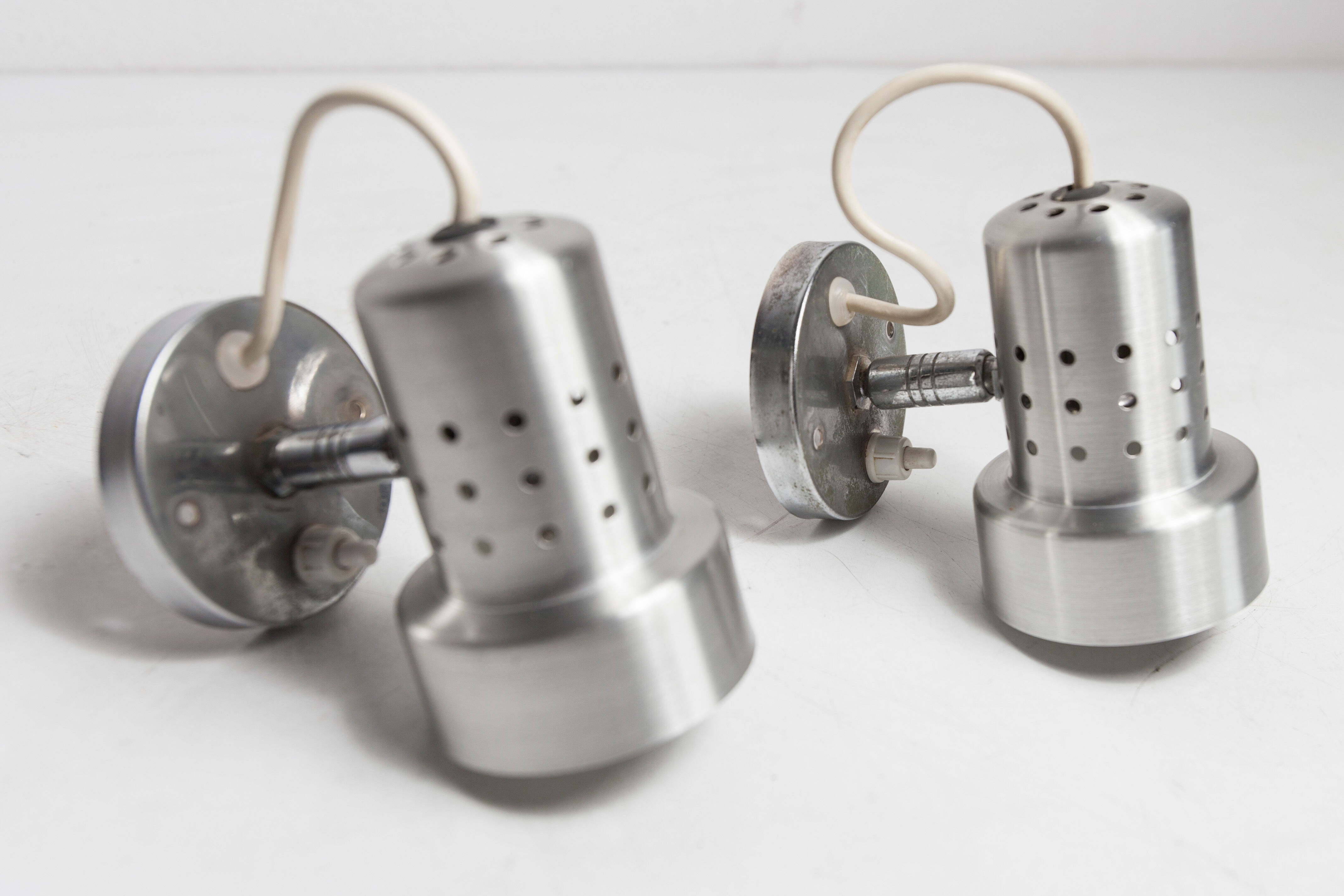 Pair of modernist wall lights in aluminum 1970