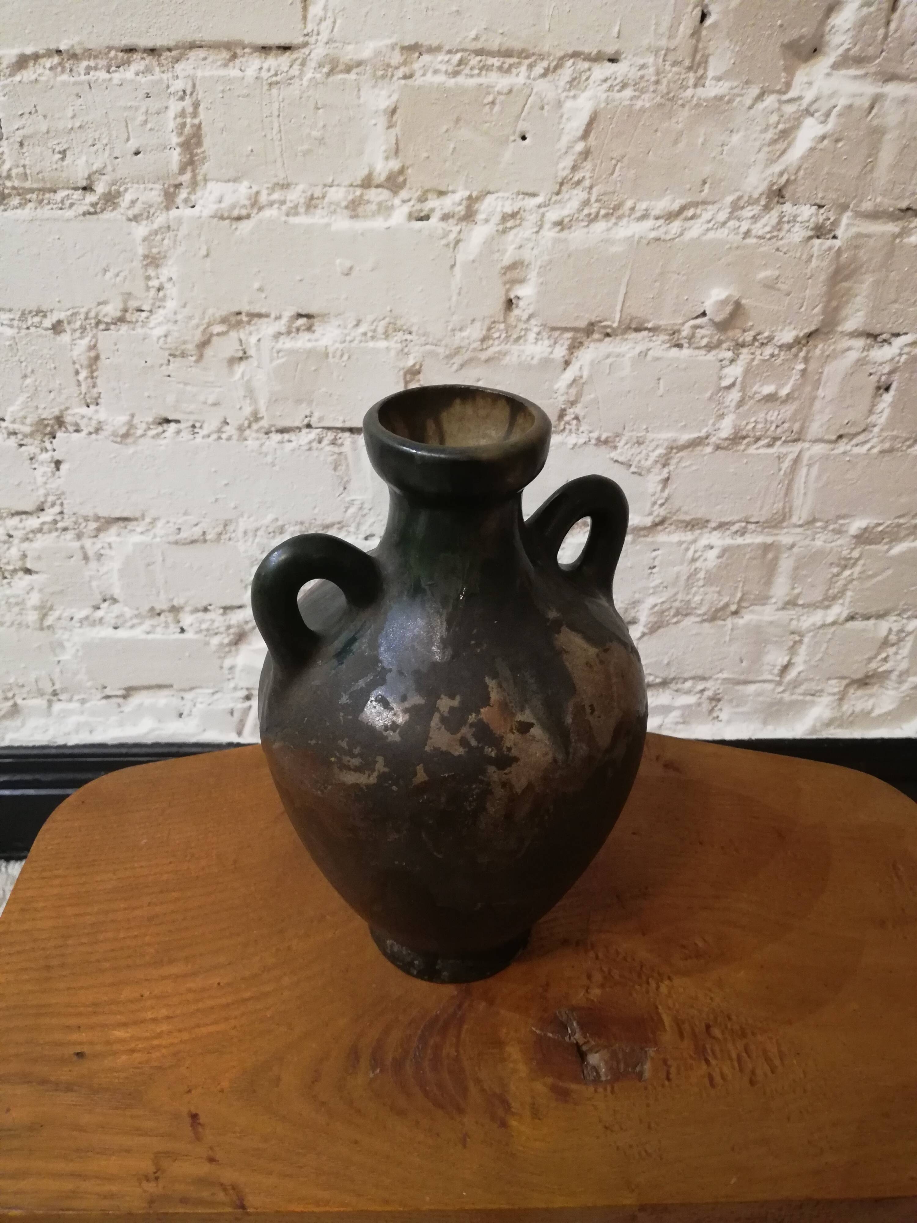 Old glazed terracotta vase