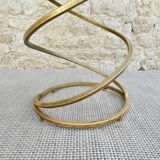 Spring-shaped end table in gold metal