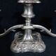 English silver metal candelabra decorated with vine leaves
