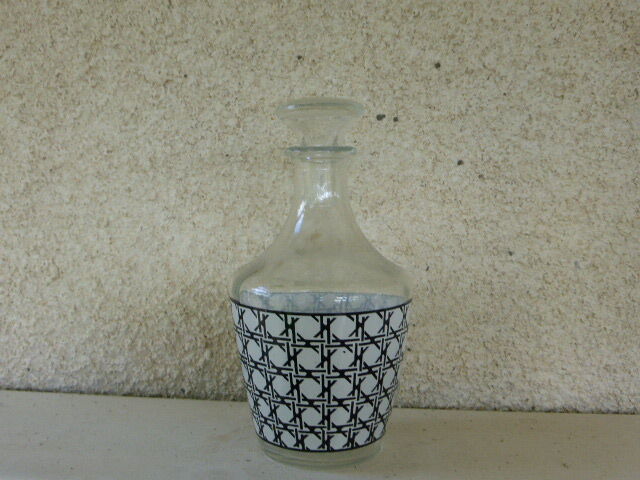 Carafe has liquor, caning vintage 1960 geometric patterns