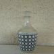 Carafe has liquor, caning vintage 1960 geometric patterns