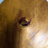 Small octagonal mirror in gold leather