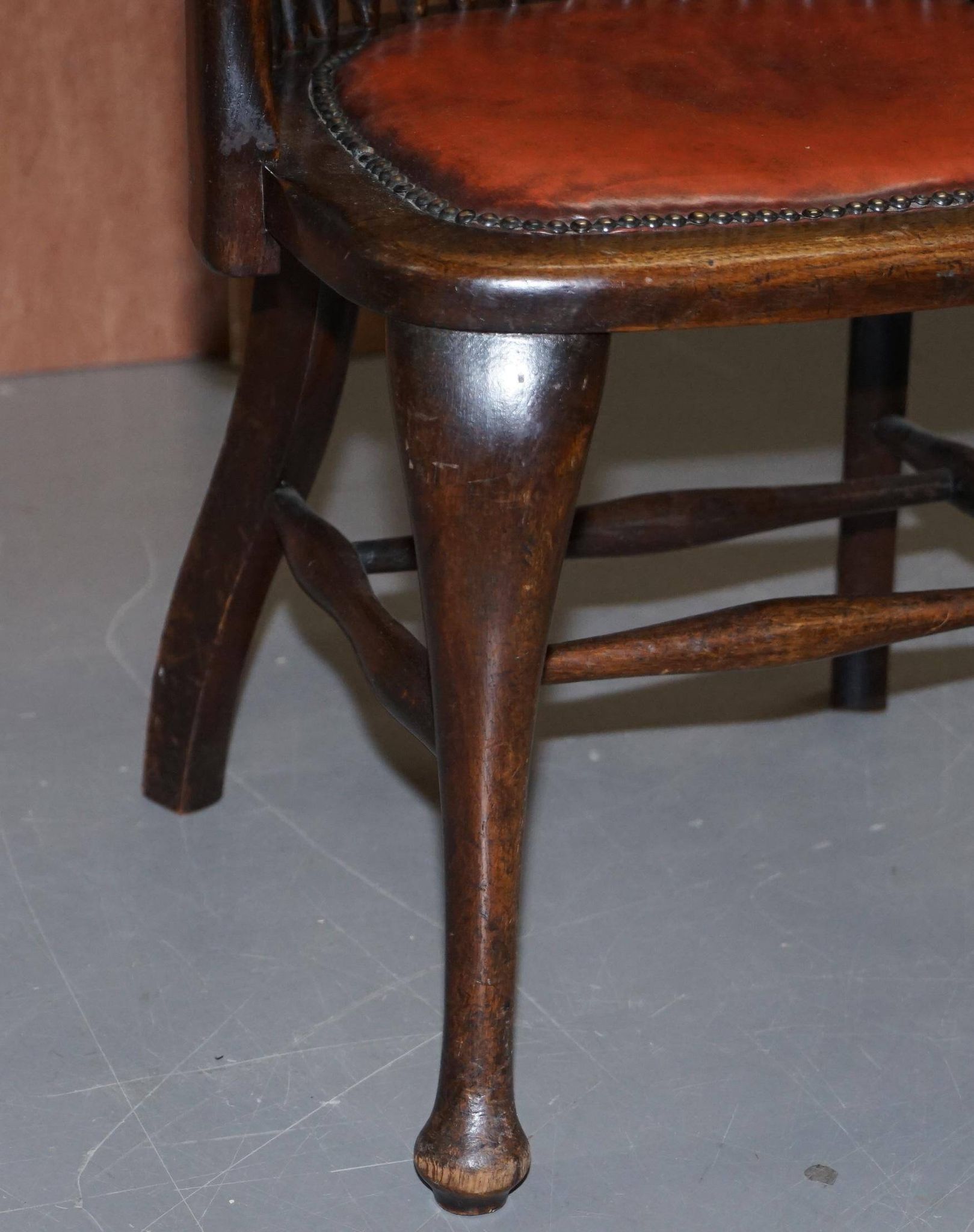 Antique English Edwardian captain's chair in oak by Ralph Johnson.