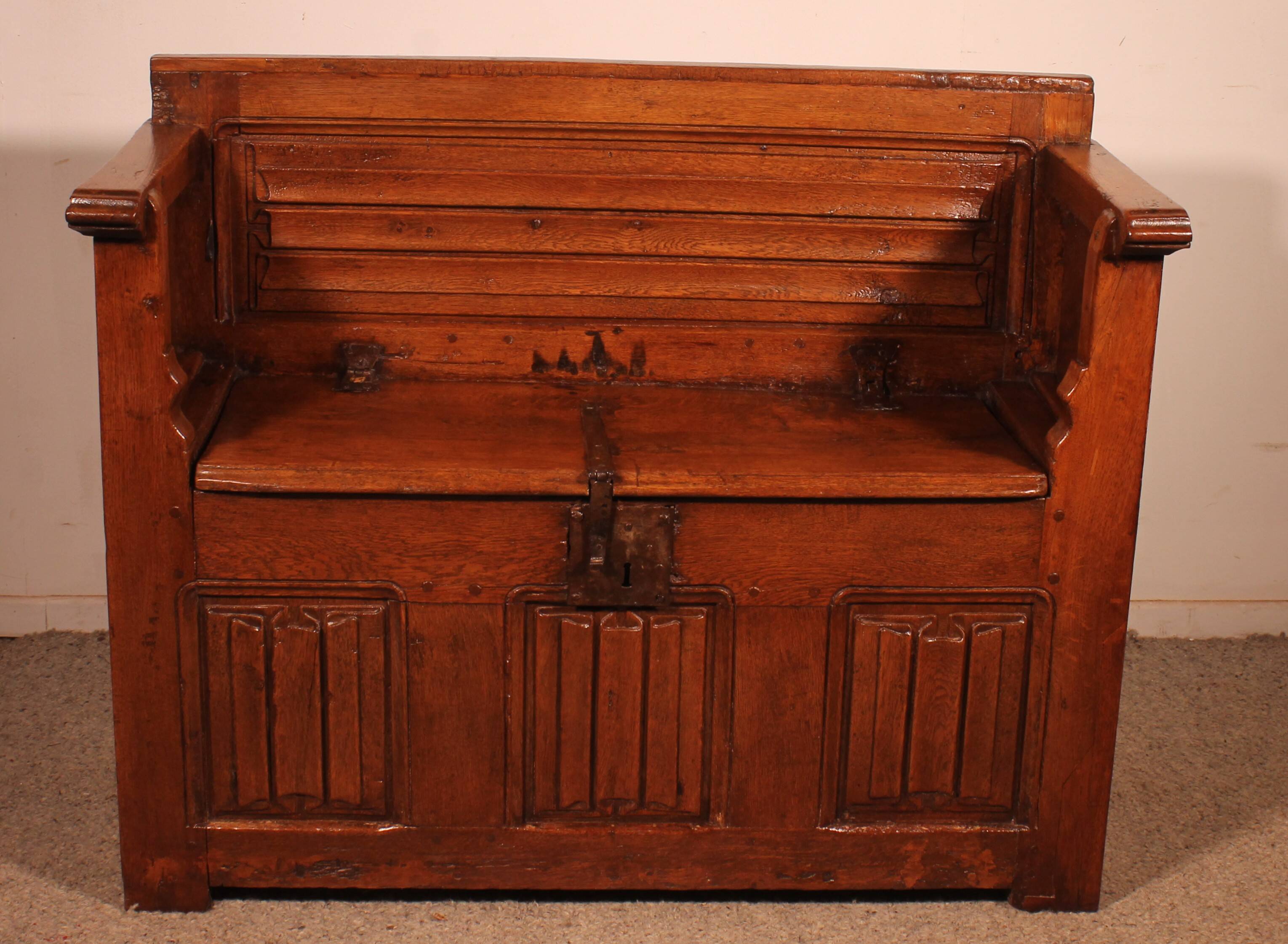 Oak bench chest with incorporated panels and gothic elements