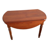 Round table with folding sides