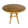 Wooden table and round rattan