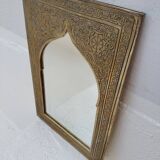 Golden oriental mirror