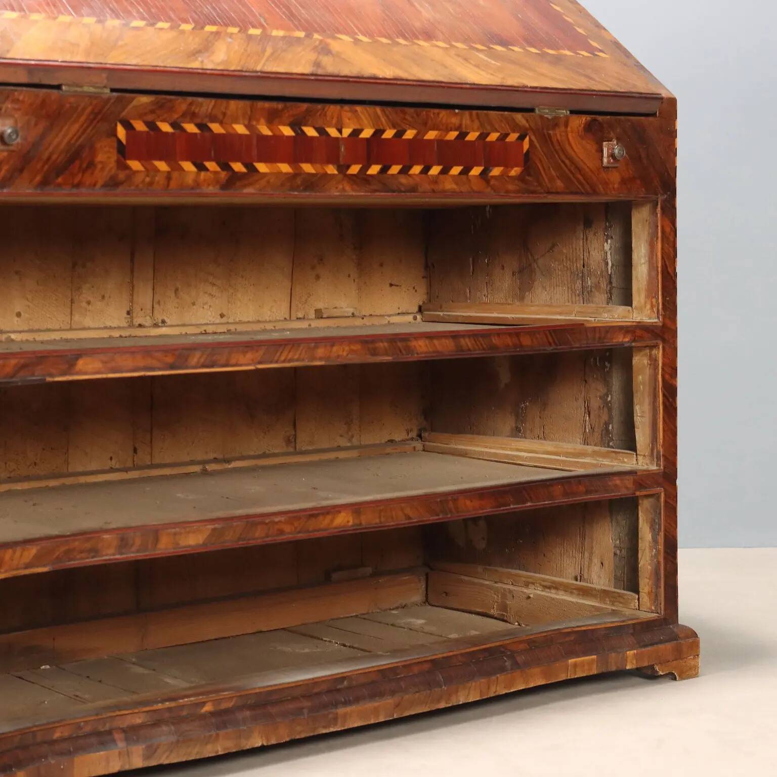 Antique drop-leaf cabinet in various types of wood, Italy, 18th century.