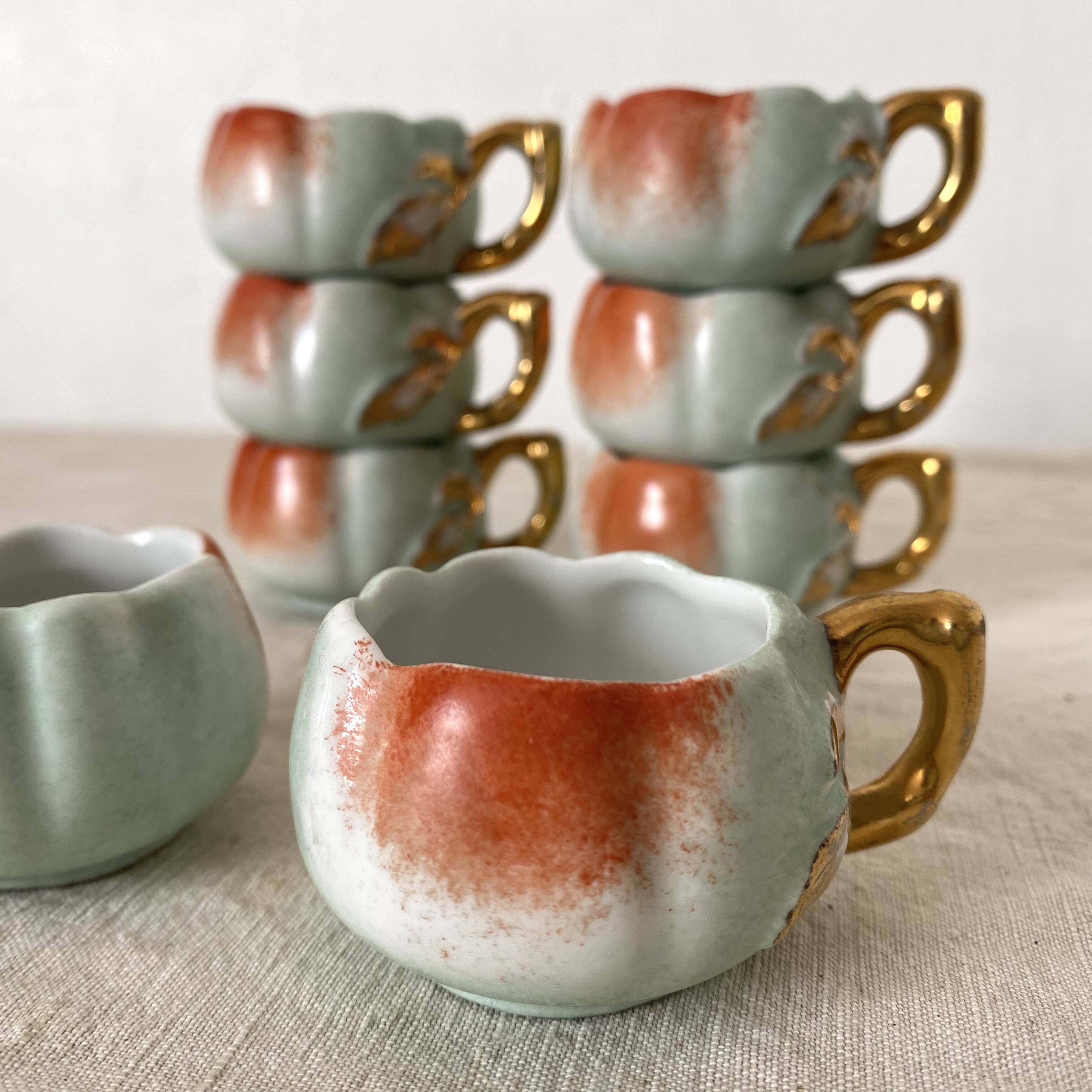 Calvados liqueur cups in slip, 1940s