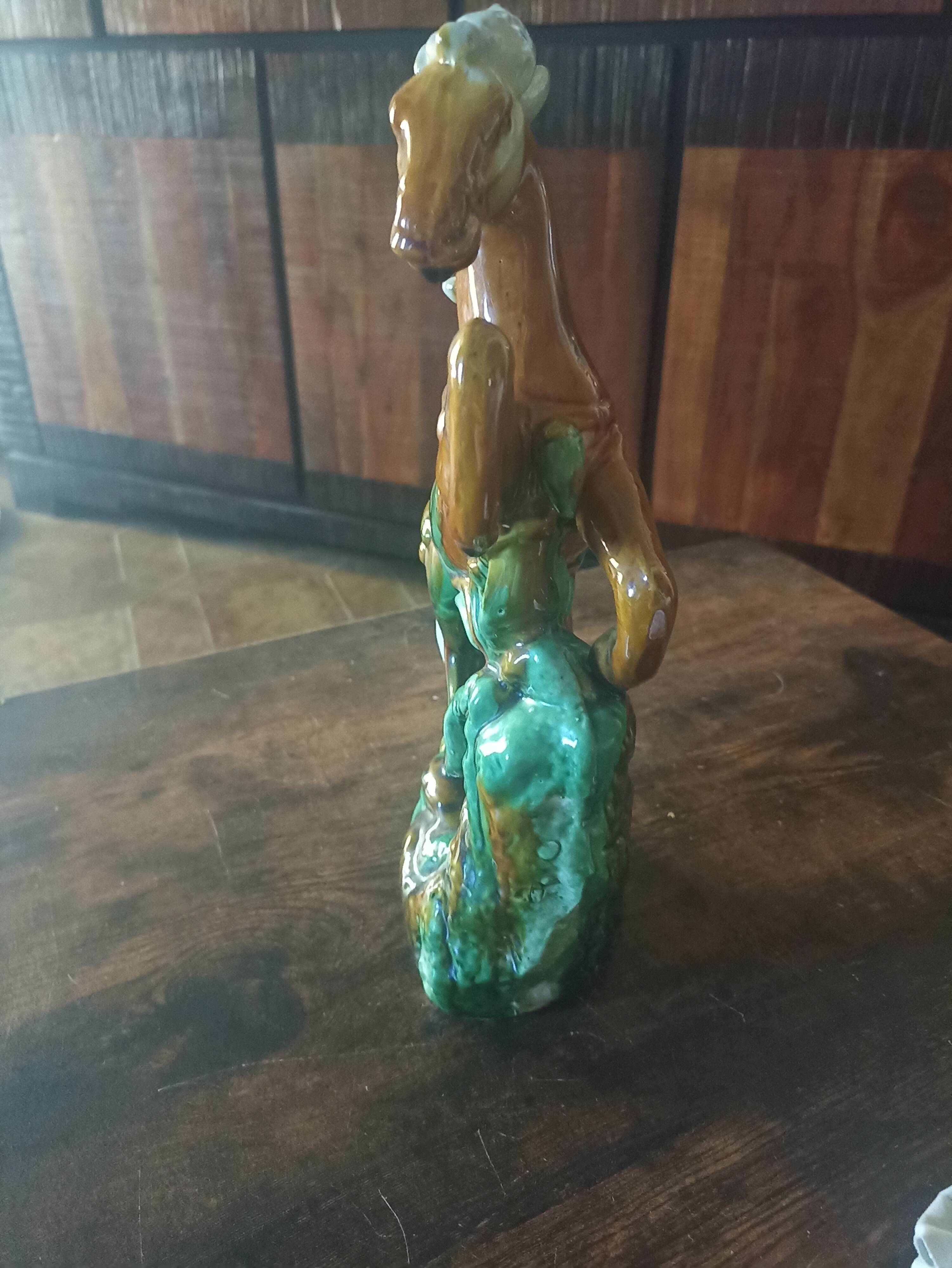 Rearing horse statue