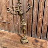 Large bronze candle holder with putti angel
