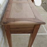 Console in solid walnut with a natural finish, featuring three drawers with a belt.