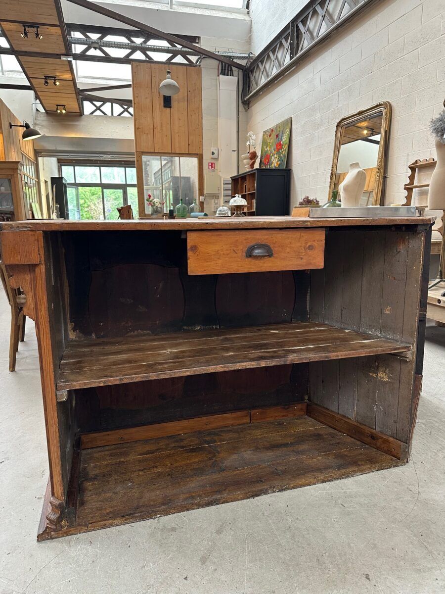 Large corner bar counter from the late 19th century.