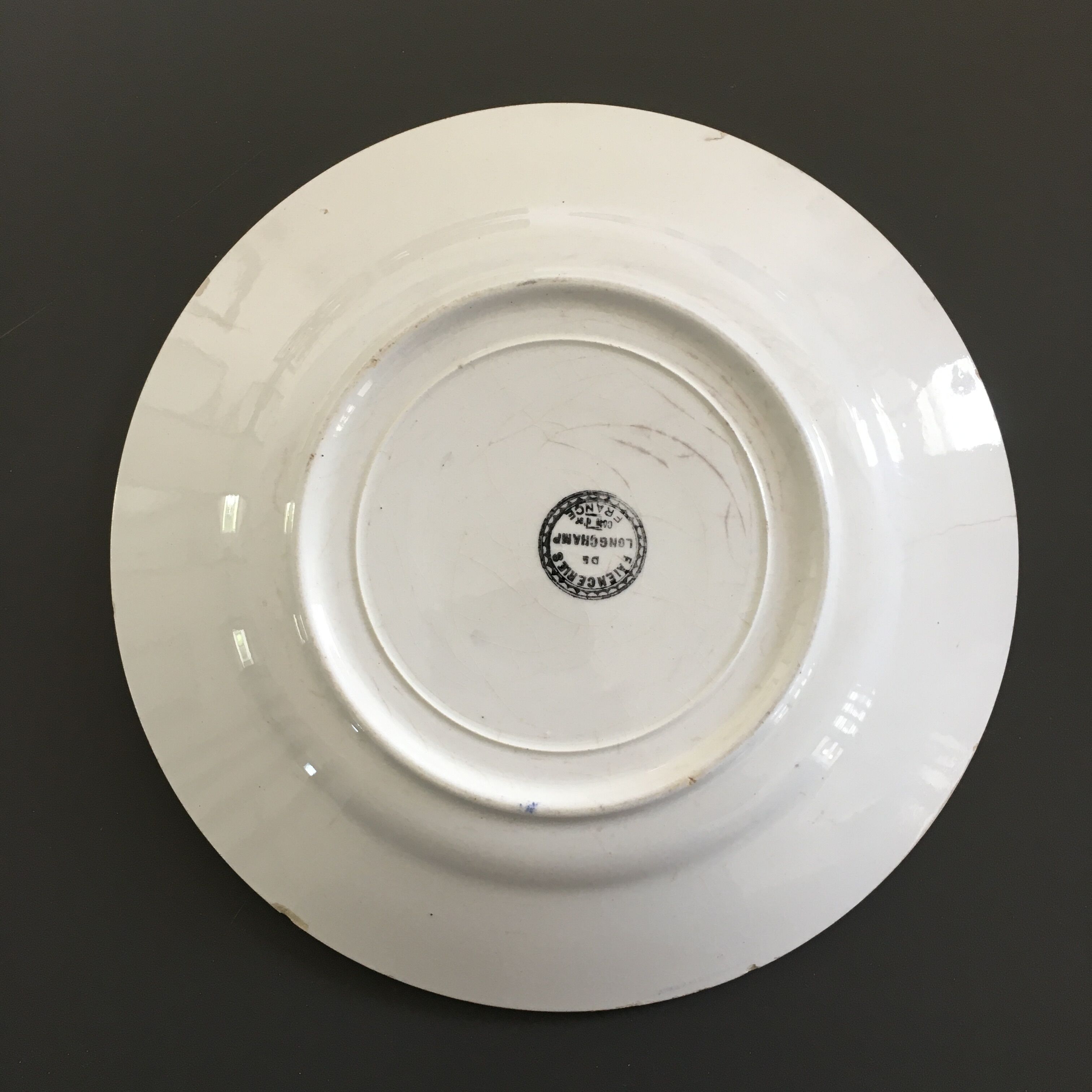 Antique plate decorated with roses