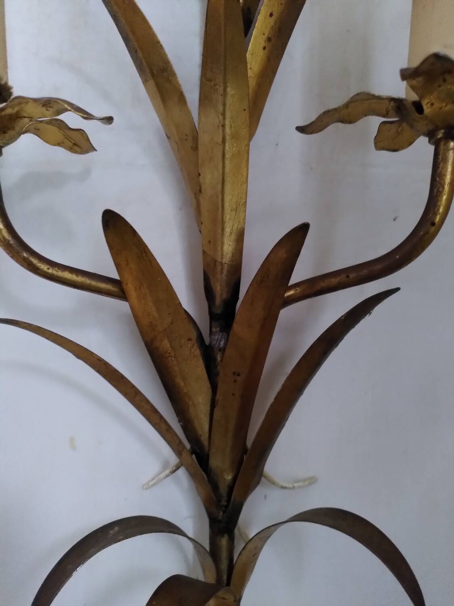 Pair of gold metal leaf wall sconces