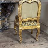 Remarkable small armchair in carved and gilded wood, Venice, early 18th century