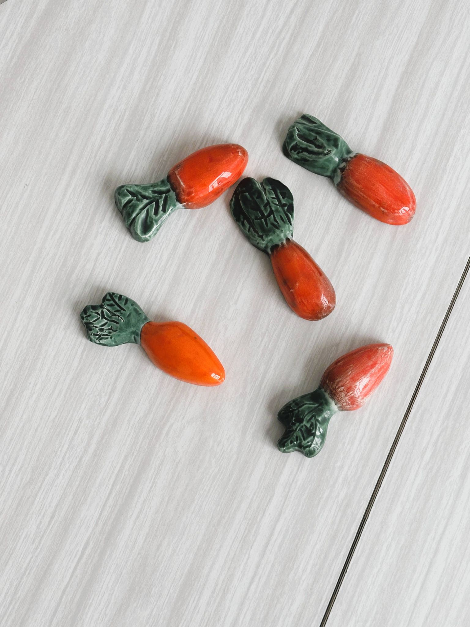 set of ceramic carrot knife holders