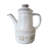 Decorated sandstone teapot