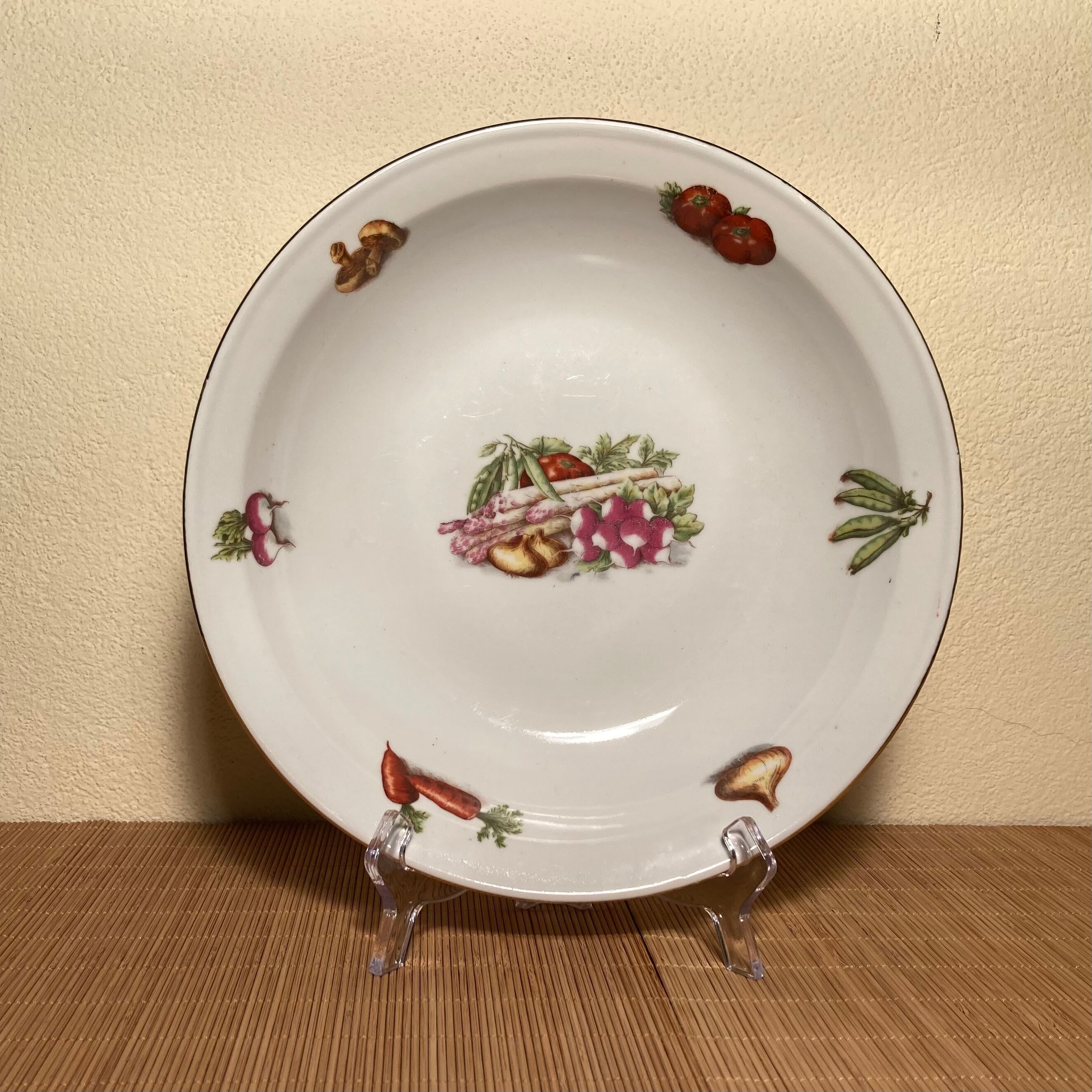 Plat creux porcelaine à feu décor légumes liseré doré - années 60