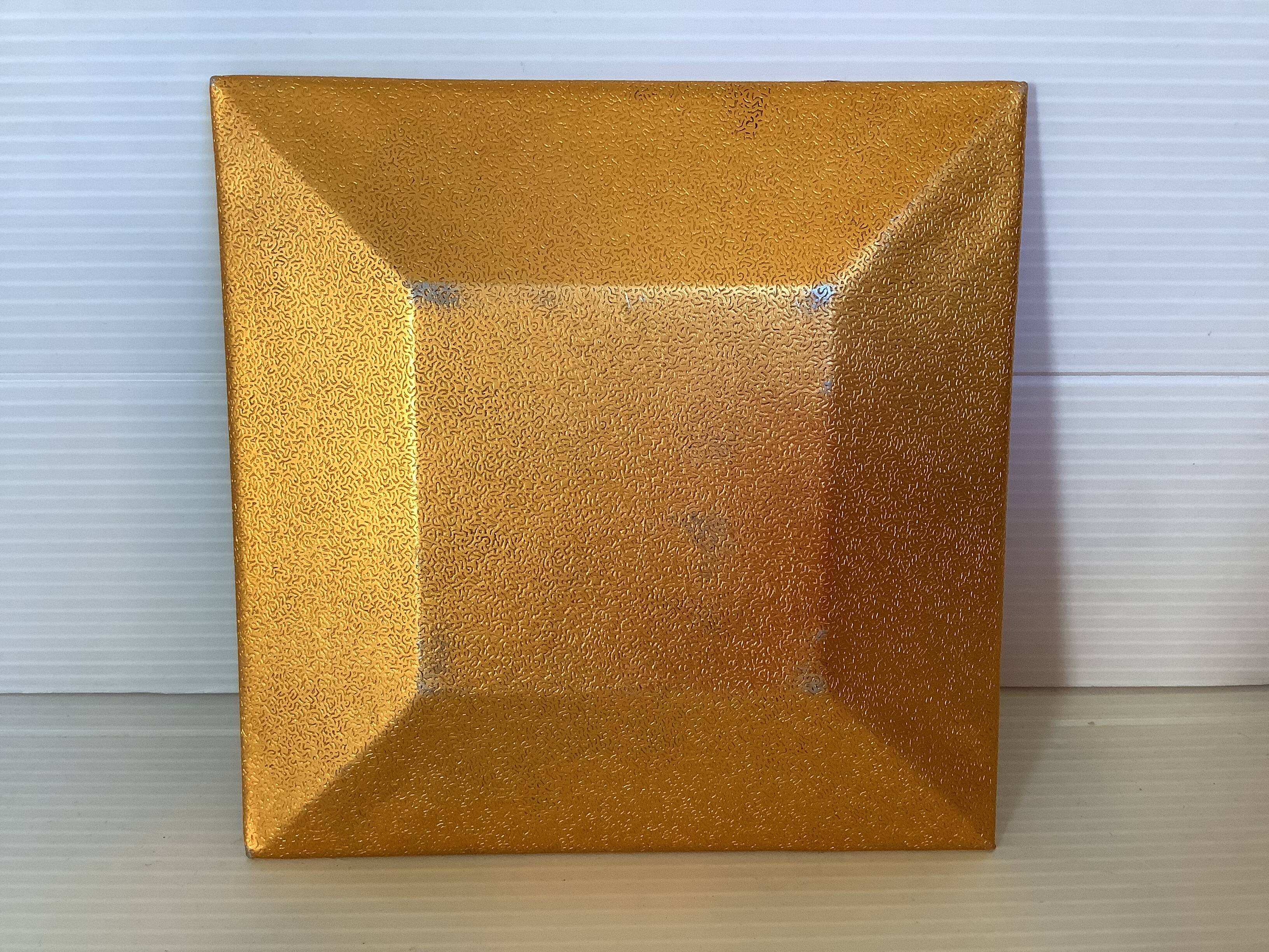 Empty pocket of multicolored glass pellets