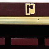 Burgundy lacquered wooden bar cabinet by designer Paco Rabanne.