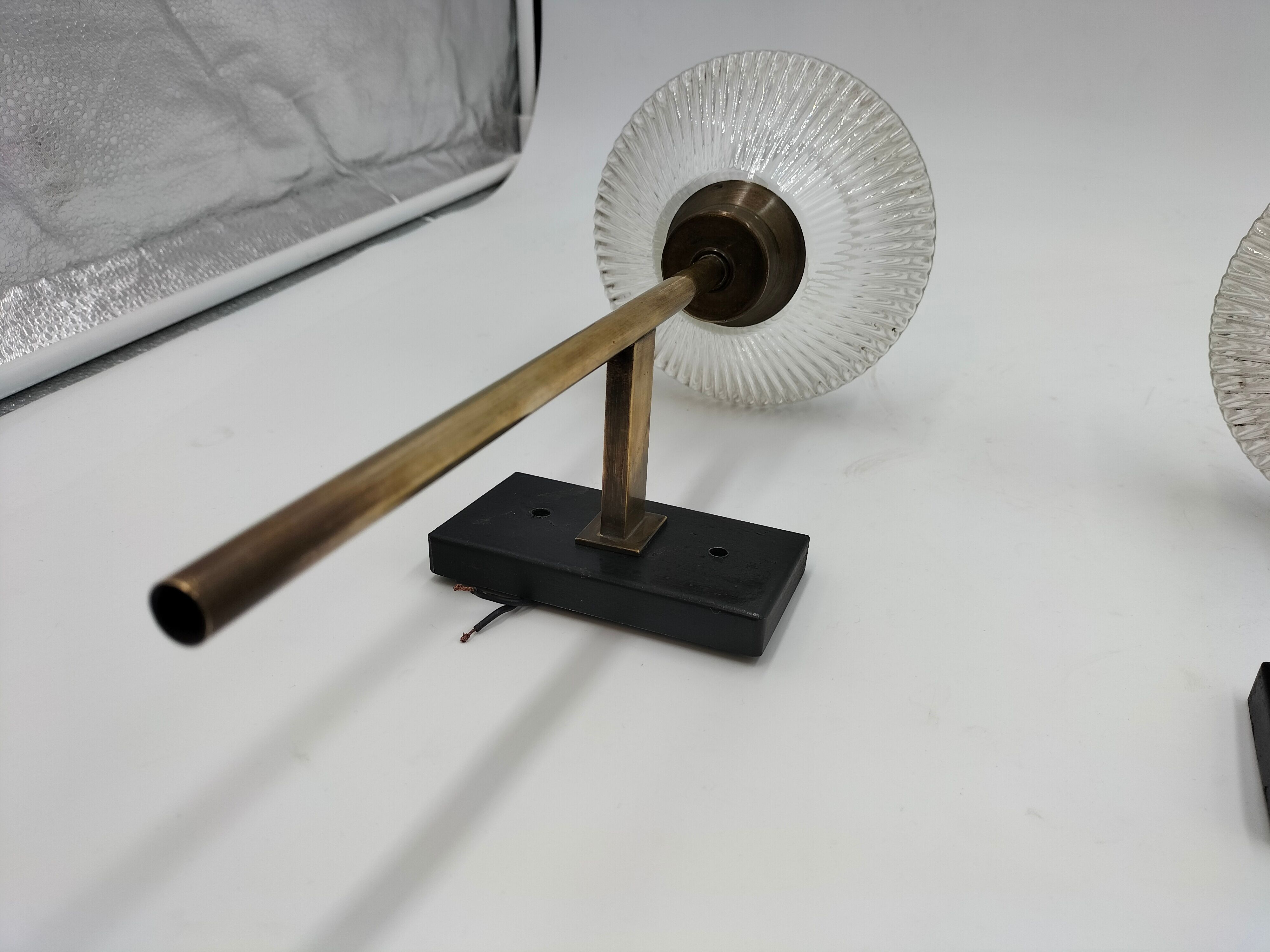 Pair of brass and glass wall lamps